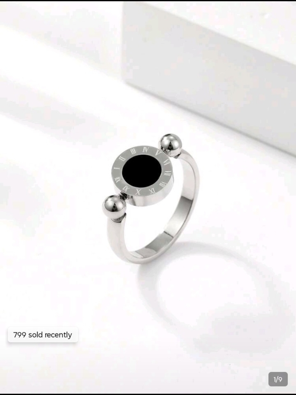 Silver Tone Black Disc Ring with Roman Numeral Accent